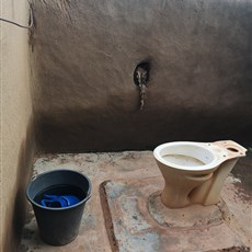Auberge Kunkolo, Tiébélé - outdoor pit toilet