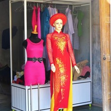 Hoai Nhon - traditional ao dai beside modern mini